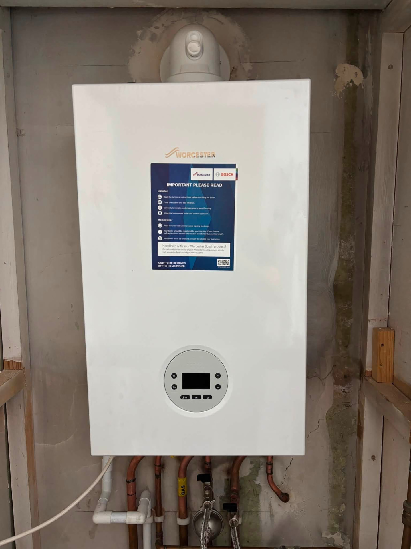 The newly fitted Worcester combi boiler in Newark, tidily piped below